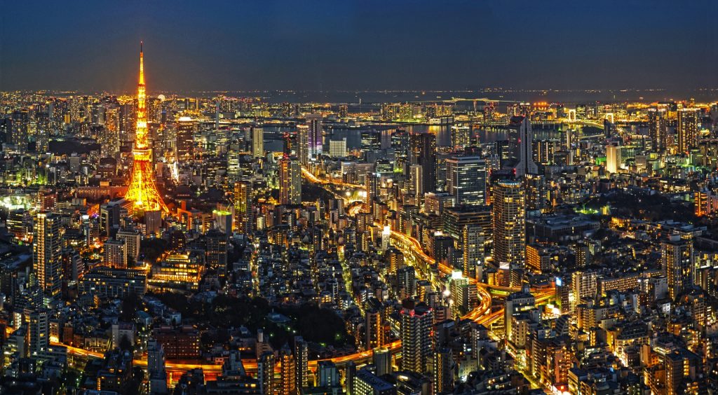 tokyo skyline at night with tokyo tower illuminated